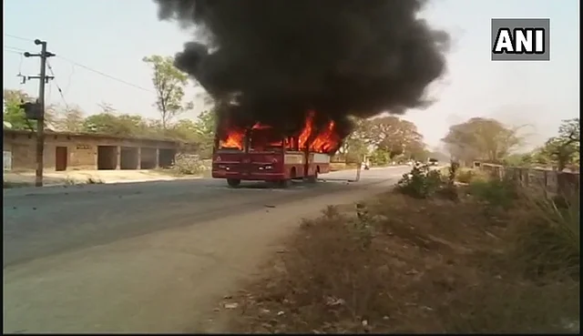 A bus that was vandalised and torched in Azamgarh.