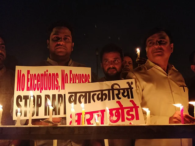 Hundreds gathered on Thursday at midnight to protest against Kathua-Unnao rape cases.