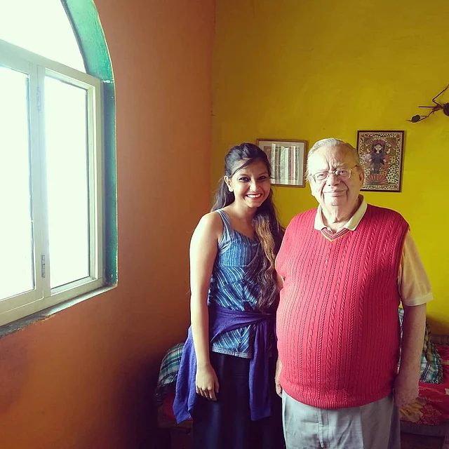 A photograph with Ruskin Bond, near the window he writes beside.