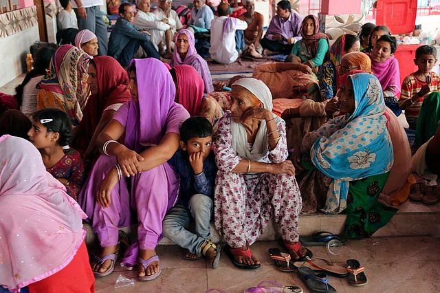 Indians take shelter at Chichi Mata, a Hindu temple turned to a relief camp, after they moved from their villages owing to India-Pakistan cross border firing, at Samba district.
