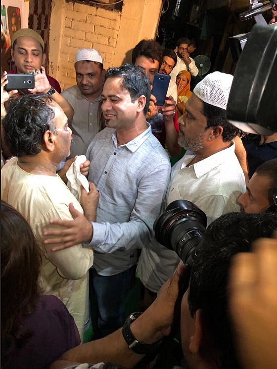 Ankit’s father, Yashpal, at the Iftar along with Dr Kafeel Khan. 