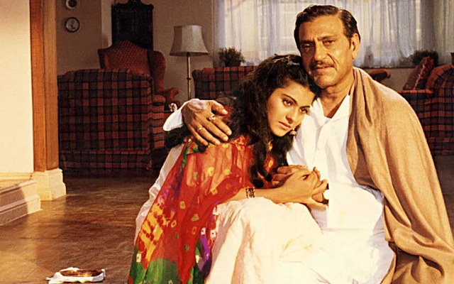 Amrish Puri and Kajol in a still from <i>Dilwale Dulhania Le Jayenge</i>.