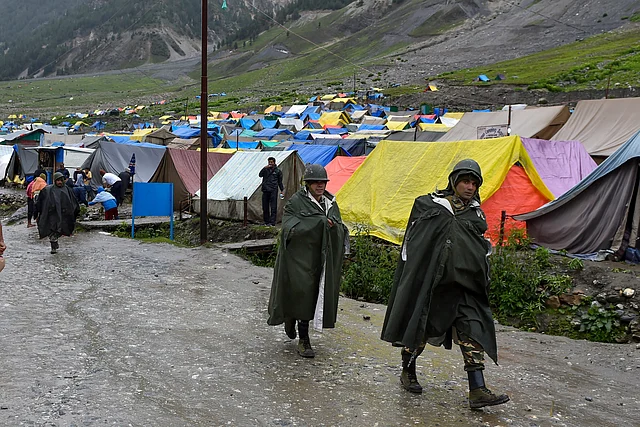 CRPF personnel patrol near Amarnath base camp at Baltal, in Ganderbal district of central Kashmir on Thursday. 