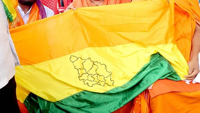 Protesters holding a North Karnataka flag. 