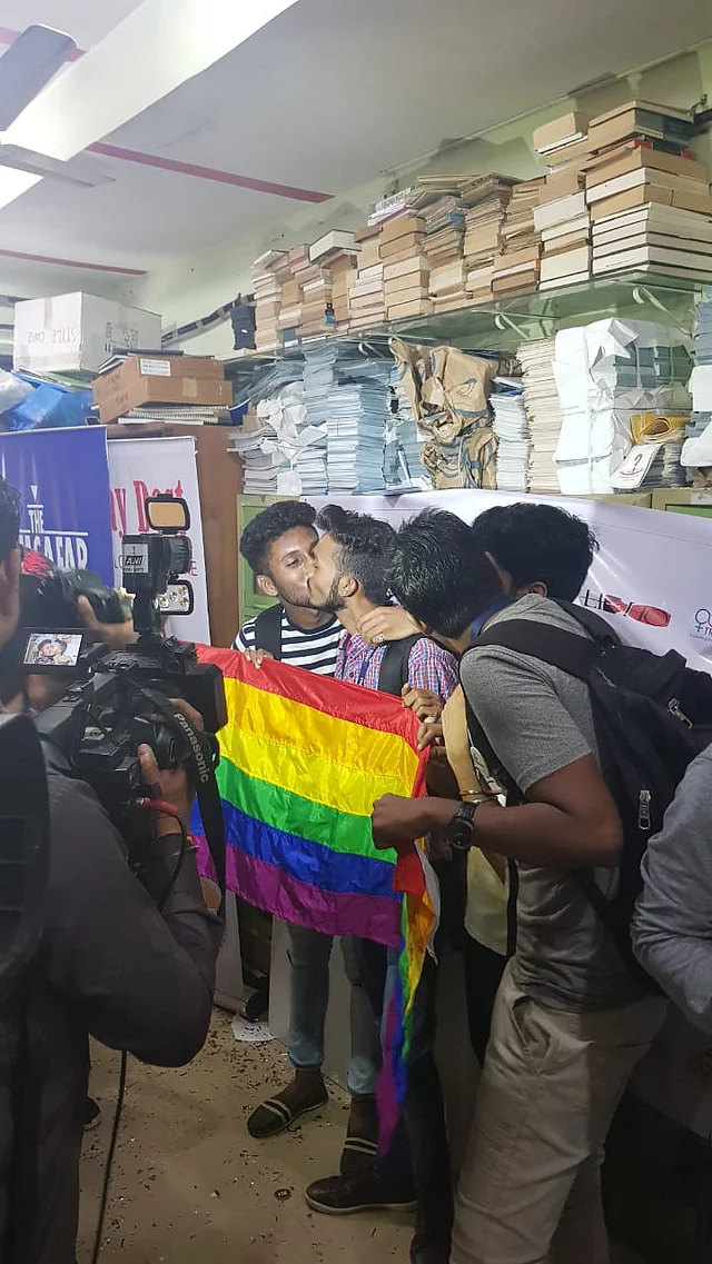 Couples kiss and celebrate the Supreme Court’s verdict. 