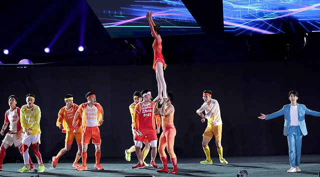 Dancers perform during the closing ceremony for the 18th Asian Games in Jakarta, Indonesia.