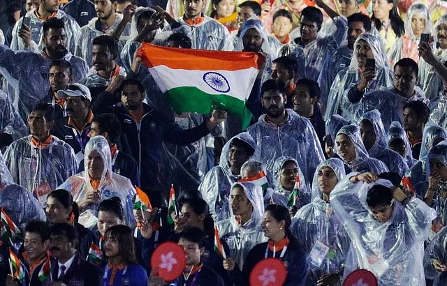Indian athletes march into the closing ceremony for the 18th Asian Games in Jakarta, Indonesia on Sunday.