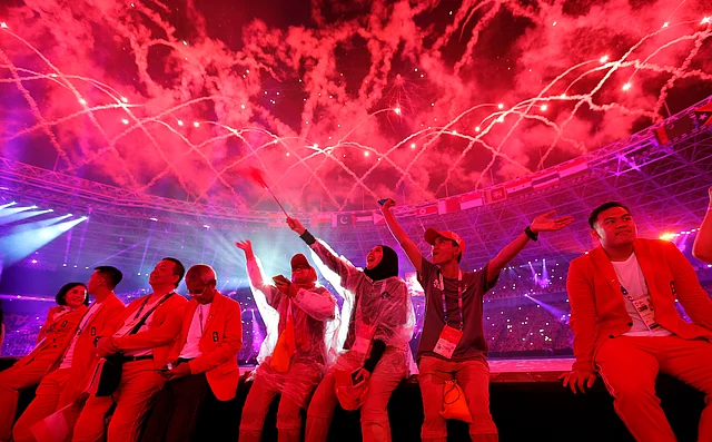 Fireworks explode over the stadium during the closing ceremony for the 18th Asian Games in Jakarta, Indonesia on Sunday.