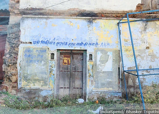 A dilapidated building reads a message to farmers of Budha village in Mandsaur district of MP. 