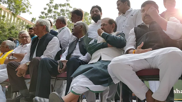 Sharad Yadav, accompanied with D Raja and Sharad Yadav at the Kisan Marc.