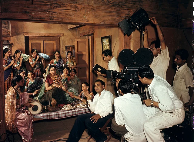 An Indian movie crew filming a wedding scene at ‘Famous Studios’ in Bombay, March 1948.