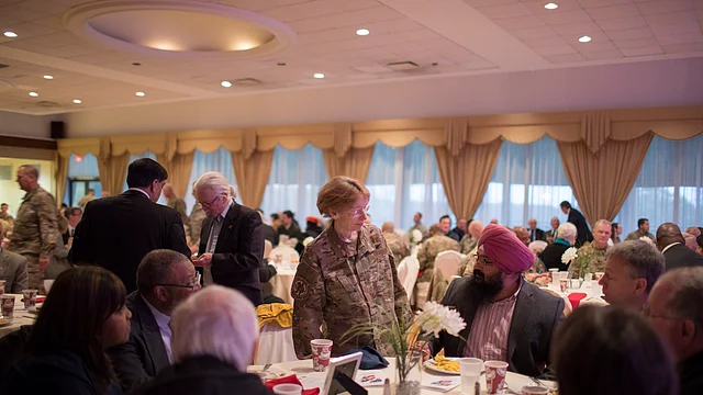 The woman who came to greet us at the table was the Adjutant General, the official host of the event.