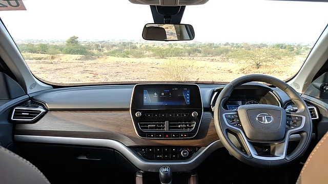 The 8.8 inch JBL infotainment system dominates the centre console. The dashboard gets an oakwood panel finish.