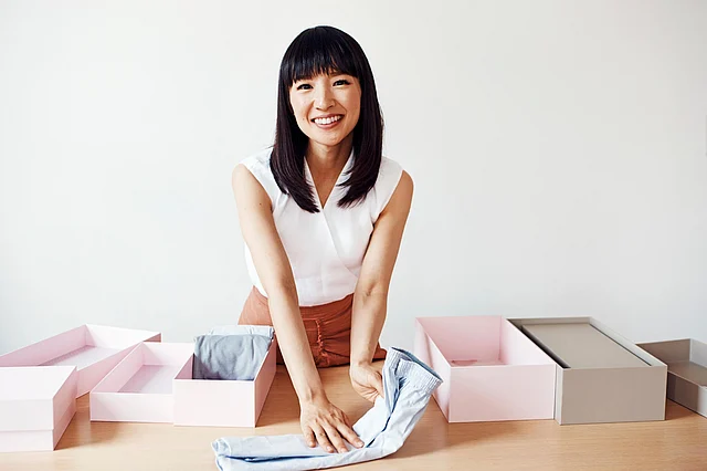 Marie initiates the couples into the KonMari project.
