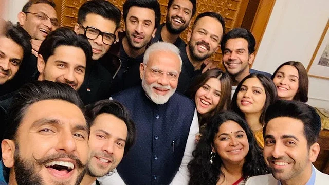 Prime Minister Narendra Modi in a selfie with Bollywood directors Karan Johar, Ashwiny Iyer, Rohit Shetty, Ekta Kapoor and actors Ranveer Singh, Bhumi Pednekar, Vicky Kaushal, Ranbir Kapoor, Alia Bhatt, Ayushmann Khurrana, Varun Dhawan, Sidharth Malhotra, Rajkummar Rao and others after their meeting, in New Delhi on Thursday, 10 January, 2019. 