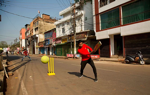Boys play cricket on a deserted street during an eleven hour general strike called by All Assam Students’ Union (AASU) and North East Students’ Organisation (NESO) in Guwahati on Tuesday, 8 January, 2019.