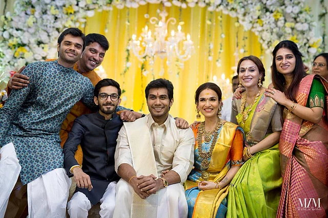 Music composer Anirudh Ravichander (in black) with the bride Soundarya, groom Vishagan, Aishwarya Dhanush (in green) and friends.