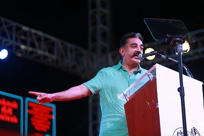 Makkal Needhi Maiam (MNM) President Kamal Haasan addresses during a party rally in Puducherry.
