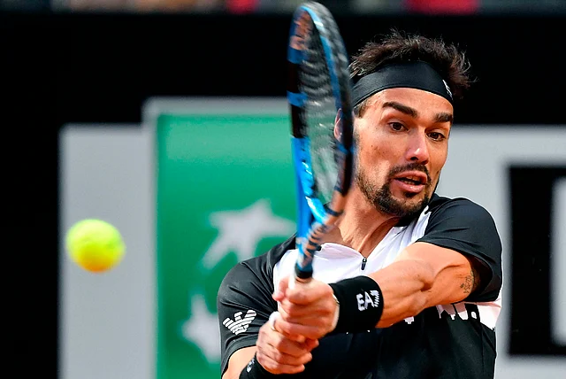 Italy’s top player Fabio Fognini wore a shirt featuring a design of Rome’s skyline during a 6-3, 6-4 win over Jo-Wilfried Tsonga.