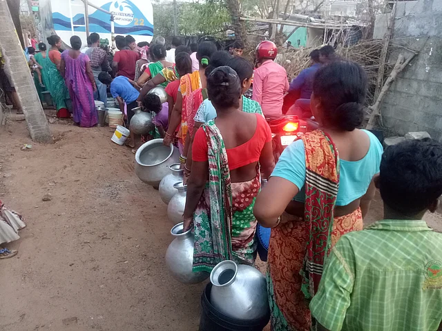 Long line for water in Salia Sahi, Bhubaneswar.