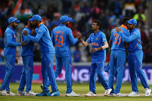 India cricket team celebrate end of the Cricket World Cup match between India and Pakistan at Old Trafford in Manchester, England, Sunday, June 16, 2019. 