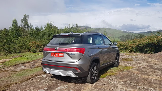 The rear looks quite busy with different plastic tones and fixtures. 