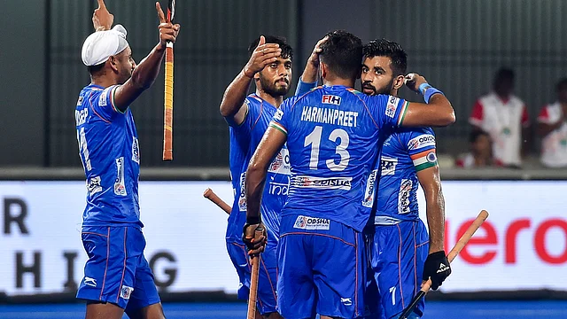 India’s Harmanpreet Singh (13) being greeted by teammates after scoring a goal against South Africa during FIH Men’s Series Finals 2019, at Kalinga Stadium in Bhubaneswar on Saturday, June 15.