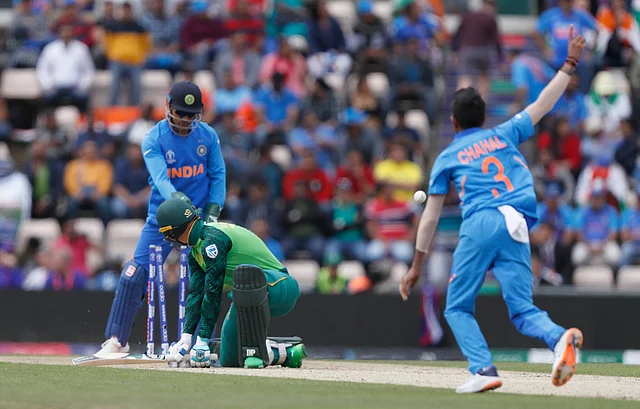 South Africa’s Rassie van der Dussen isclean bowled by India’s Yuzvendra Chahal during their Cricket World Cup match between South Africa and India.