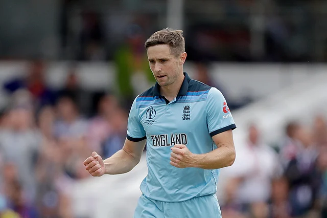 England’s Chris Woakes celebrates taking the wicket of New Zealand’s Tom Latham during the Cricket World Cup final.
