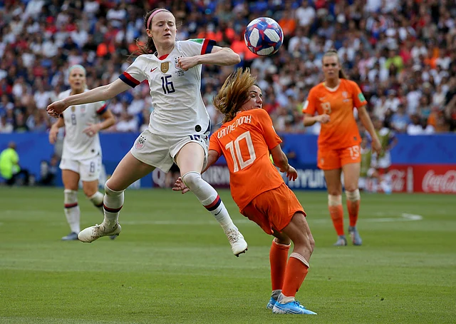 United States’ Rose Lavelle, left, is challenged by Netherlands’ Danielle Van De Donk during the Women’s World Cup final soccer match between US and The Netherlands at the Stade de Lyon in Decines, France