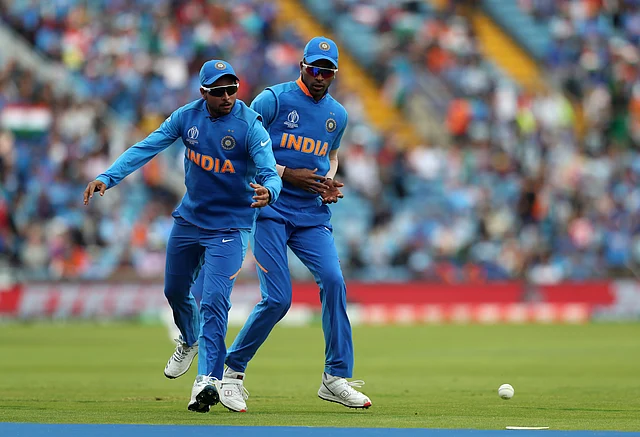 India’s Kuldeep Yadav, left, drops the ball that could’ve dismissed Sri Lanka’s Kusal Perera while almost colliding with teammate Hardik Pandya during the Cricket World Cup match between India and Sri Lanka at Headingley in Leeds, England, Saturday, July 6, 2019. 
