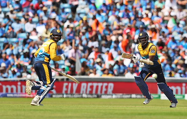 Sri Lanka’s Dhananjaya de Silva, left, and Angelo Mathews take a run during the Cricket World Cup match between India and Sri Lanka at Headingley in Leeds, England, Saturday, July 6, 2019. 