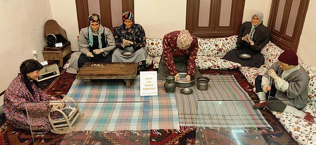 Dioramas depicting familial bonding over food inside Emine Gogus, the culinary museum at Gaziantep
