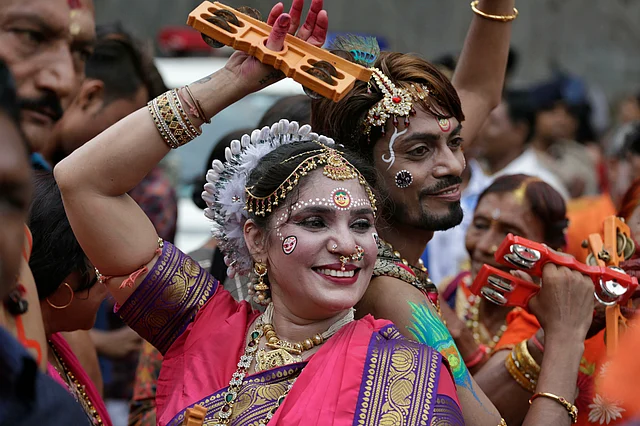 Devotees dance during the annual festival of Rath Yatra.