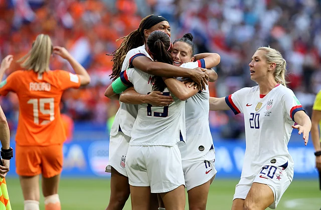 US players celebrate at the end of the Women’s World Cup final soccer match between US and The Netherlands at the Stade de Lyon in Decines