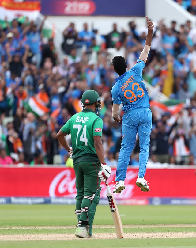 India’s Jasprit Bumrah, right, jumps to celebrate the dismissal of Bangladesh’s Sabbir Rahman during the Cricket World Cup match.