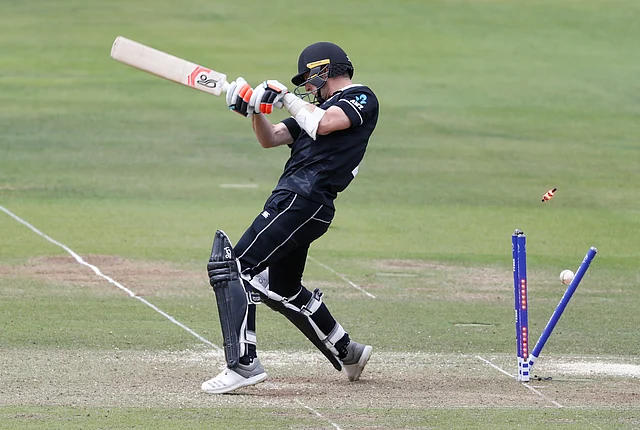 New Zealand’s Matt Henry is clean bowled by England’s Jofra Archer during the Cricket World Cup final.