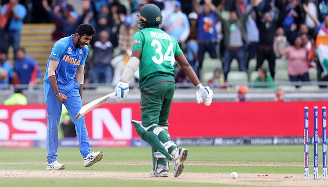 Indian cricketers celebrate the dismissal of Bangladesh’s Mustafizur Rahman the last Bangladeshi wicket, during the Cricket World Cup match.