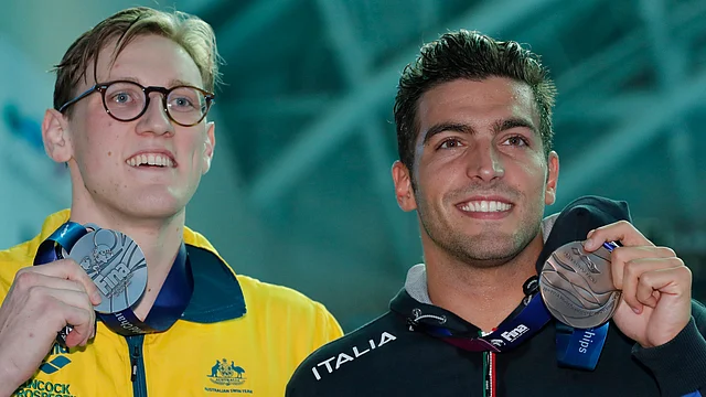 Horton (left) went and clicked a photo with bronze medalist Italy’s Gabriele Detti instead.