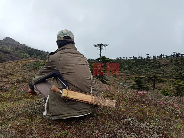 One of the members of the search and rescue team waiting to be airlifted near the crash site of the ill-fated AN-32 aircraft in Arunachal Pradesh.