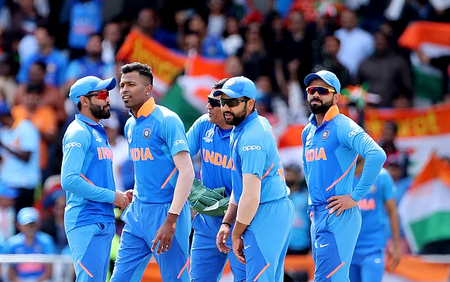 India’s Hardik Pandya, second left, and teammates celebrate the dismissal of Sri Lanka’s Avishka Fernando during the Cricket World Cup match between India and Sri Lanka.
