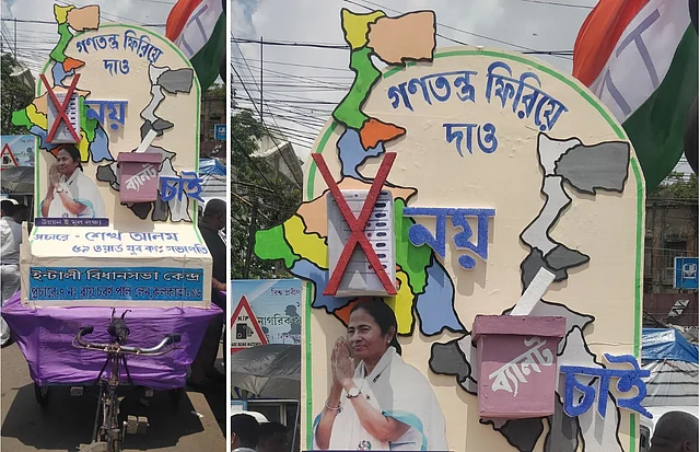 The anti-EVM installation reads, “Bring democracy back, we want ballots not EVMs.”