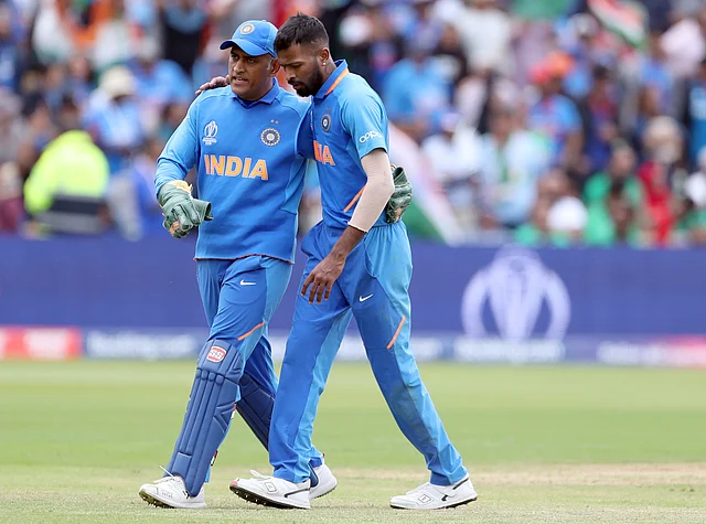 India’s Hardik Pandya, right, listens to teammate MS Dhoni after dismissing Bangladesh’s Liton Das during the Cricket World Cup match.