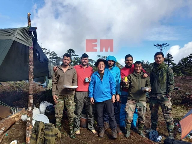 Taka Tamut and other members of the search and rescue team at the camp near the crash site in Arunachal Pradesh. 