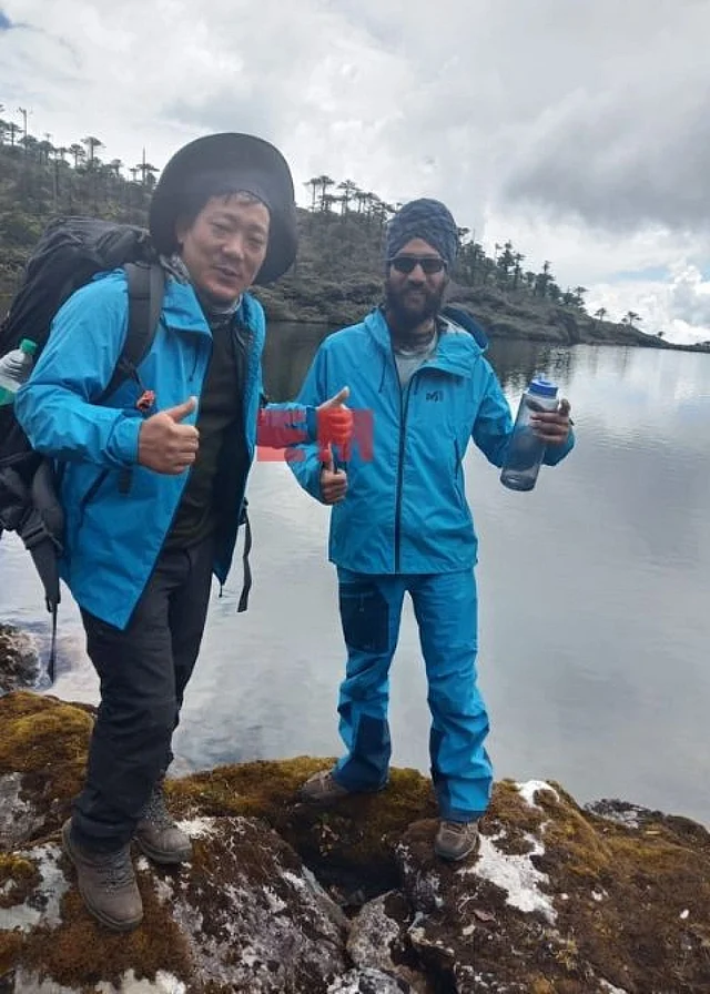 Taka Tamut (left) along with another member of the search and rescue team in Arunachal Pradesh. 