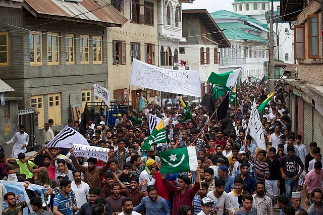 Kashmiris protest in downtown Srinagar on Friday