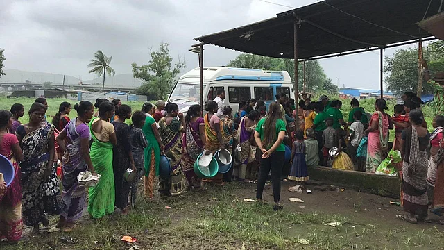 A line for rations at a Robin Hood Army #Mission5 distribution drive.