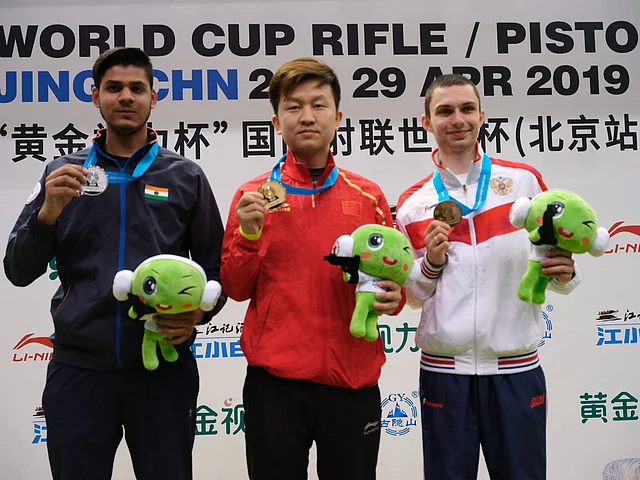 Silver medalist Divyansh Singh Panwar of India (L) after the Final 10m Air Rifle Men on Day 6 of the ISSF World Cup Rifle/Pistol on 26 April 2019.