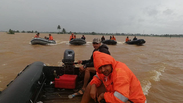 Navy teams helping with rescue operations.
