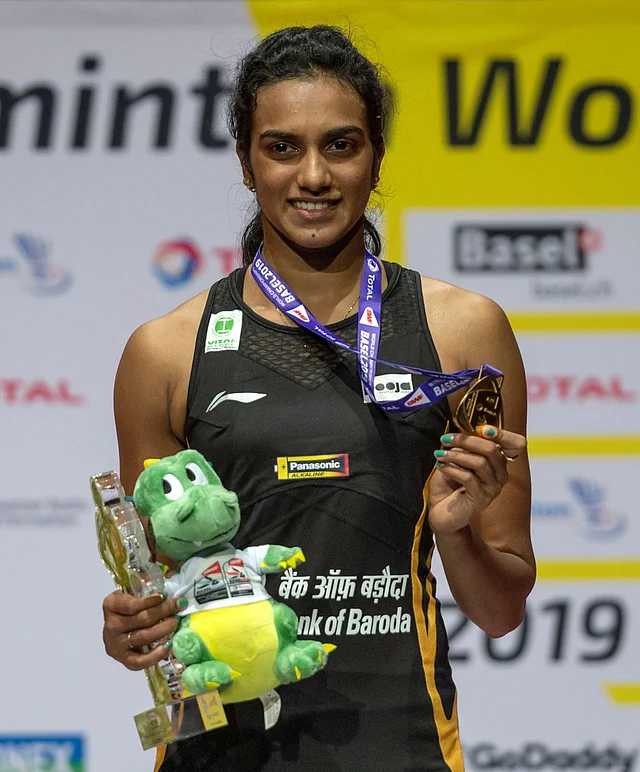 PV Sindhu beat arch-rival Nozomi Okuhara of Japan in a lop-sided summit clash in Switzerland.